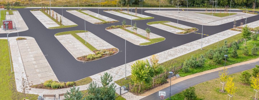 Trebū HOME labiekārto teritoriju un atklāj jaunu autostāvvietu